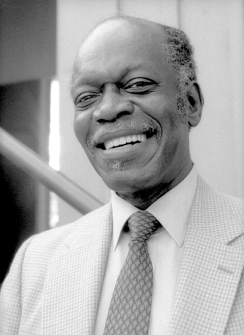Hank Jones seated at a piano, photographed at the Monterey Jazz Festival in September 1985