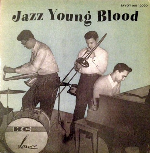 Front cover of the Savoy LP “Jazz Young Blood” (MG 12030): a black-and-white photograph on a pale blue-green ground of three young men playing tenor saxophone, trombone and piano, with a bass drum stenciled “KC” in the foreground