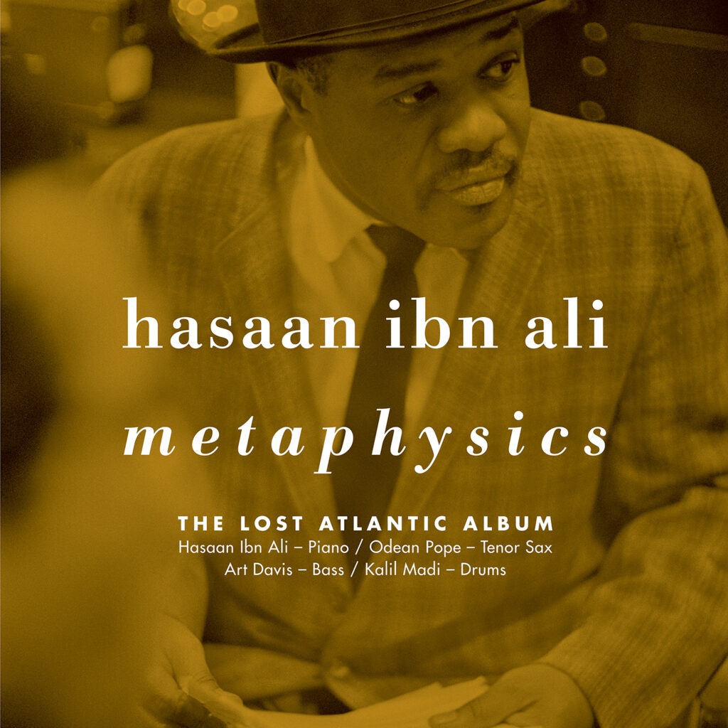 Cover of Hasaan Ibn Ali's album Metaphysics: The Lost Atlantic Album, a gold-toned photograph of the pianist in a hat and checked jacket